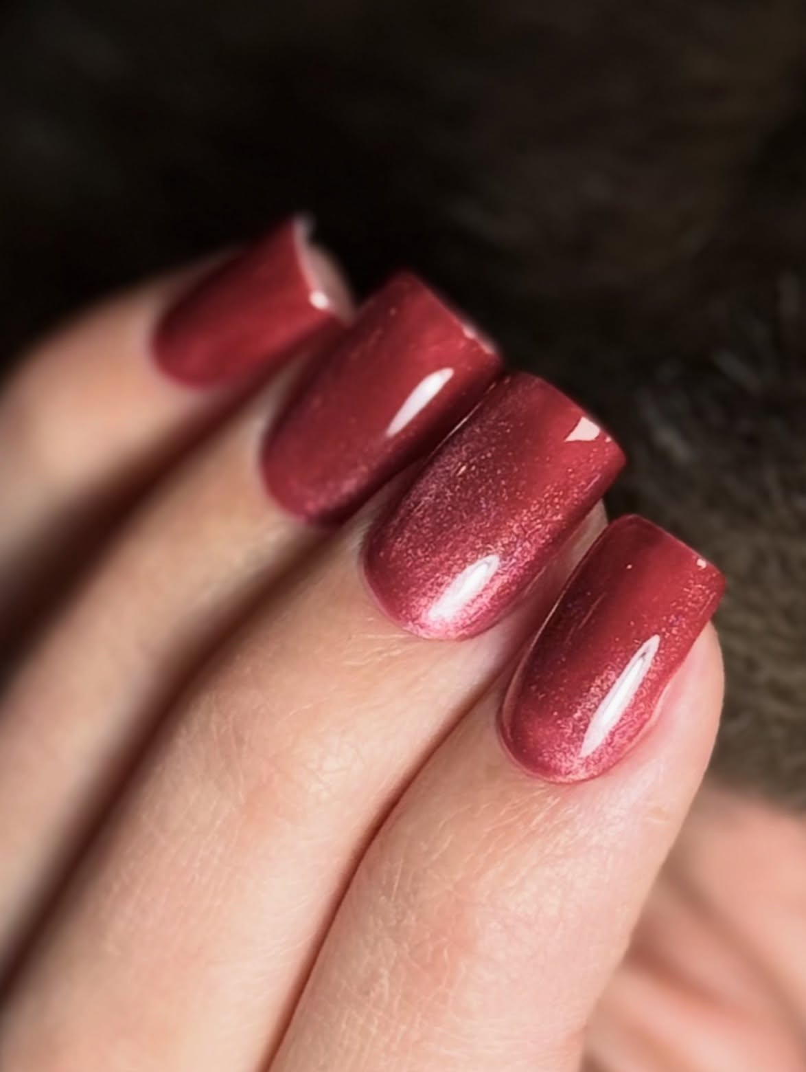 Cherry shimmer nail art close-up